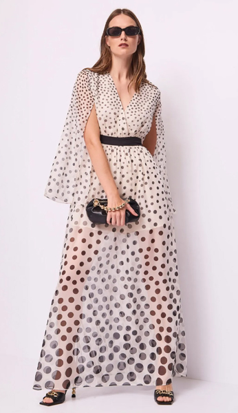 Immagine di Abito con pois e scollo a V